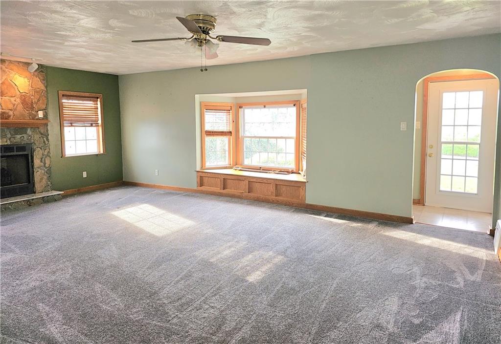 342 Concord Church Road Beaver Falls, PA 15010 - Photo 15 of 44 an empty room with windows and fan