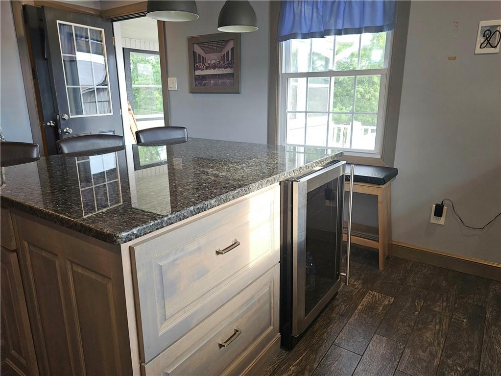 342 Concord Church Road Beaver Falls, PA 15010 - Photo 19 of 44 a kitchen with granite countertop a stove and a refrigerator