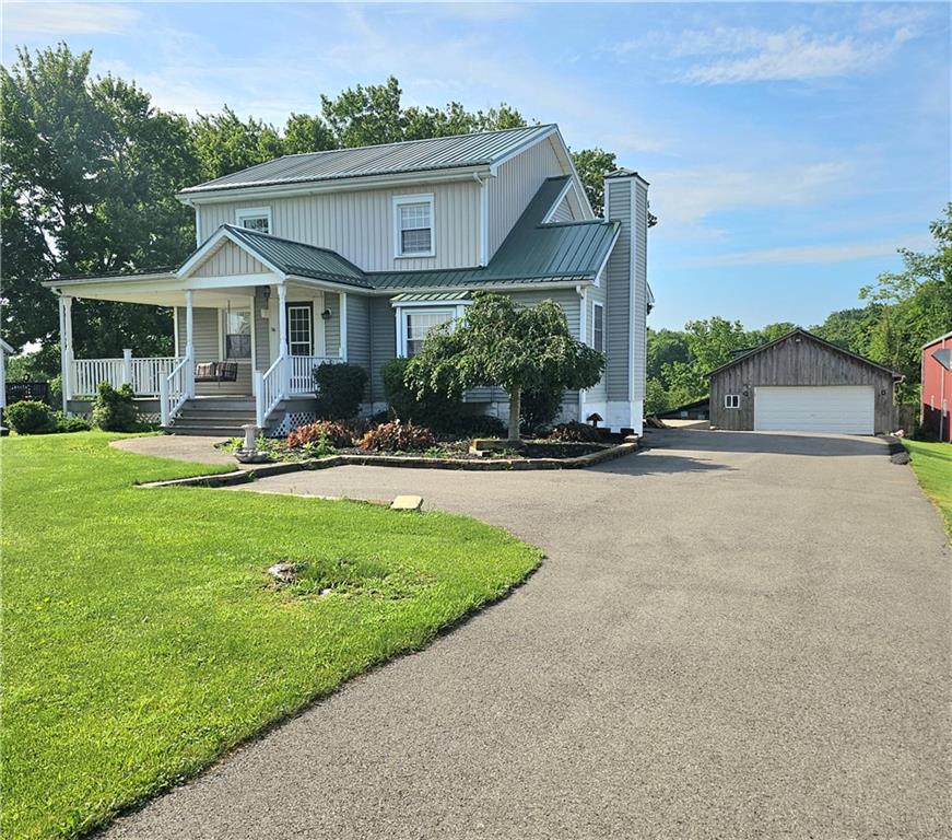 342 Concord Church Road Beaver Falls, PA 15010 - Photo 2 of 44 a front view of a house with garden