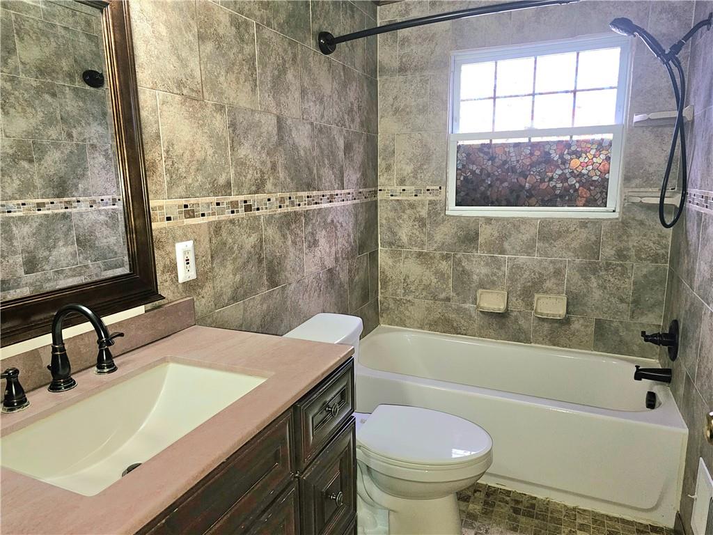 342 Concord Church Road Beaver Falls, PA 15010 - Photo 24 of 44 a bathroom with a sink a toilet and a bathtub