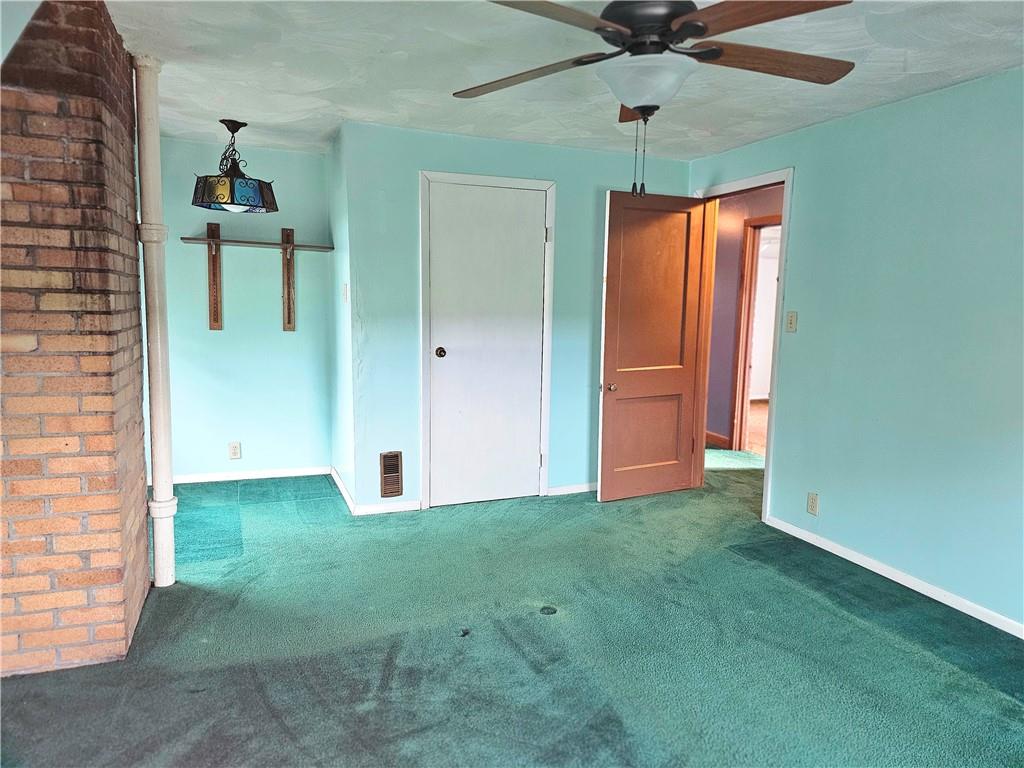 342 Concord Church Road Beaver Falls, PA 15010 - Photo 28 of 44 a view of a livingroom with a ceiling fan and window