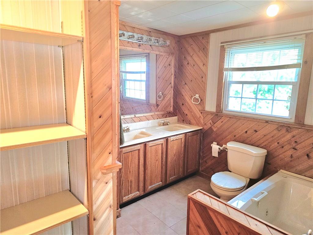 342 Concord Church Road Beaver Falls, PA 15010 - Photo 30 of 44 a kitchen with a sink cabinets and wooden floor