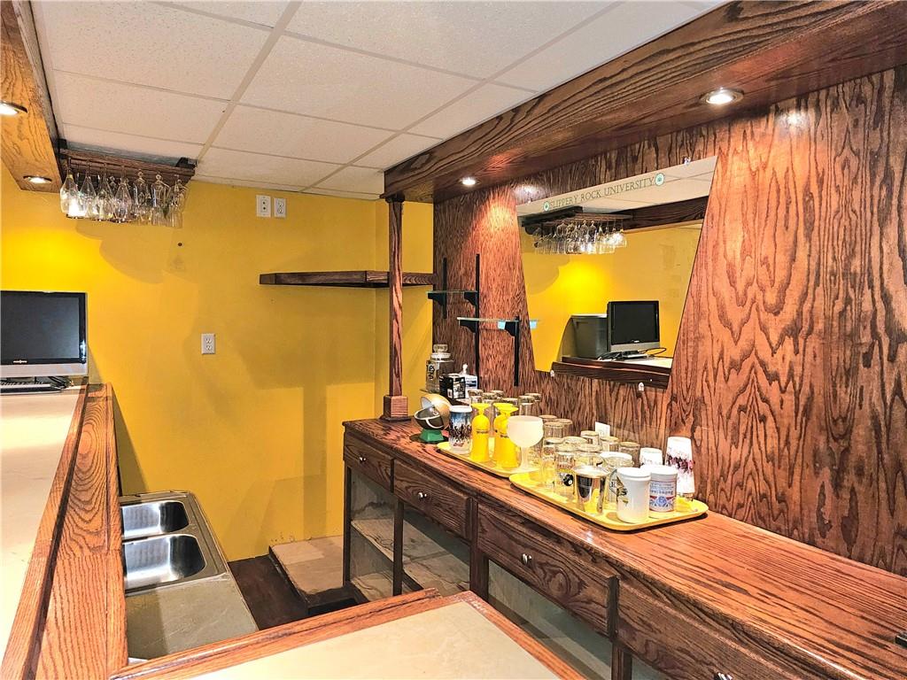 342 Concord Church Road Beaver Falls, PA 15010 - Photo 37 of 44 a room with sink mirror and furniture