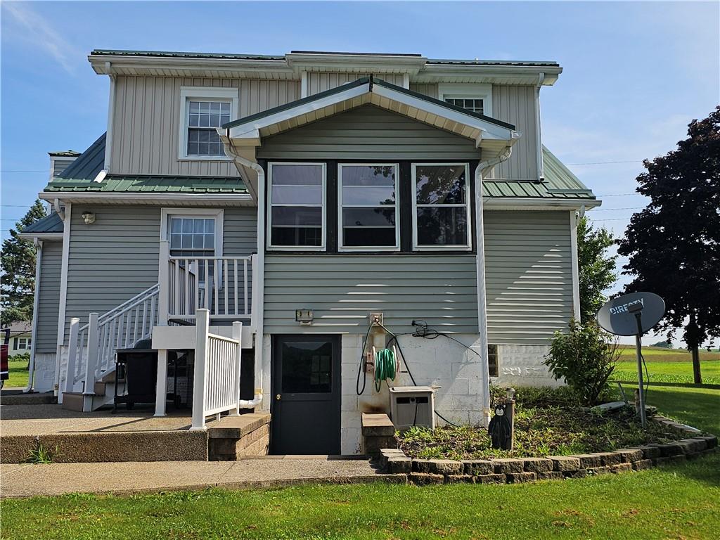 342 Concord Church Road Beaver Falls, PA 15010 - Photo 7 of 44 a front view of a house with a yard