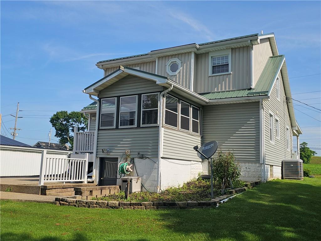 342 Concord Church Road Beaver Falls, PA 15010 - Photo 8 of 44 a front view of house with yard and green space