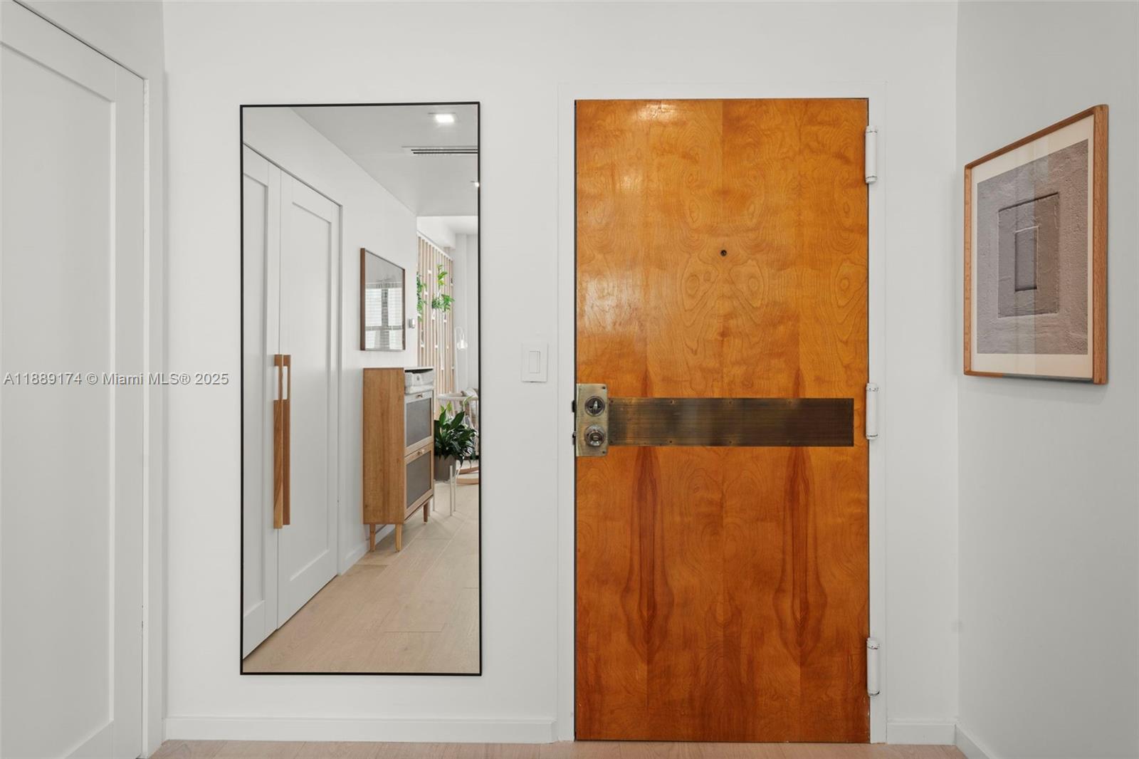 1390 Ocean Drive, Unit 202 Miami Beach, FL 33139 - Photo 17 of 80 a view of a bathroom from a hallway