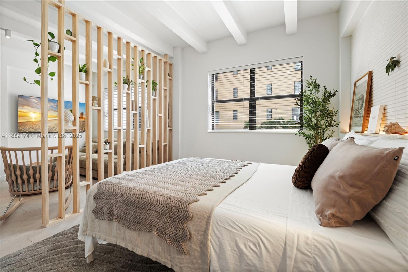 1390 Ocean Drive, Unit 202 Miami Beach, FL 33139 - Photo 21 of 80 a bedroom with a bed and a window