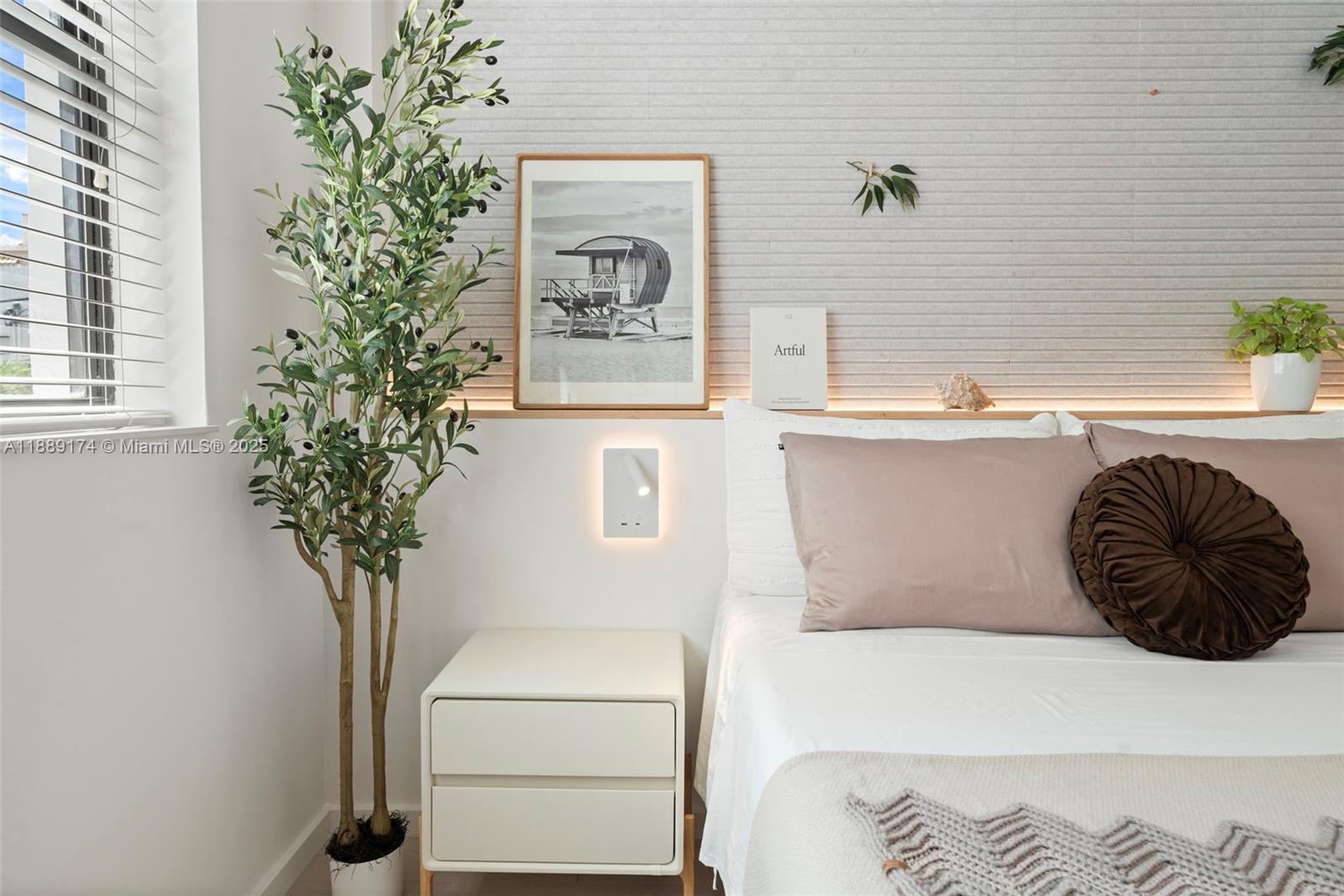 1390 Ocean Drive, Unit 202 Miami Beach, FL 33139 - Photo 22 of 80 a room with a couch and a potted plant