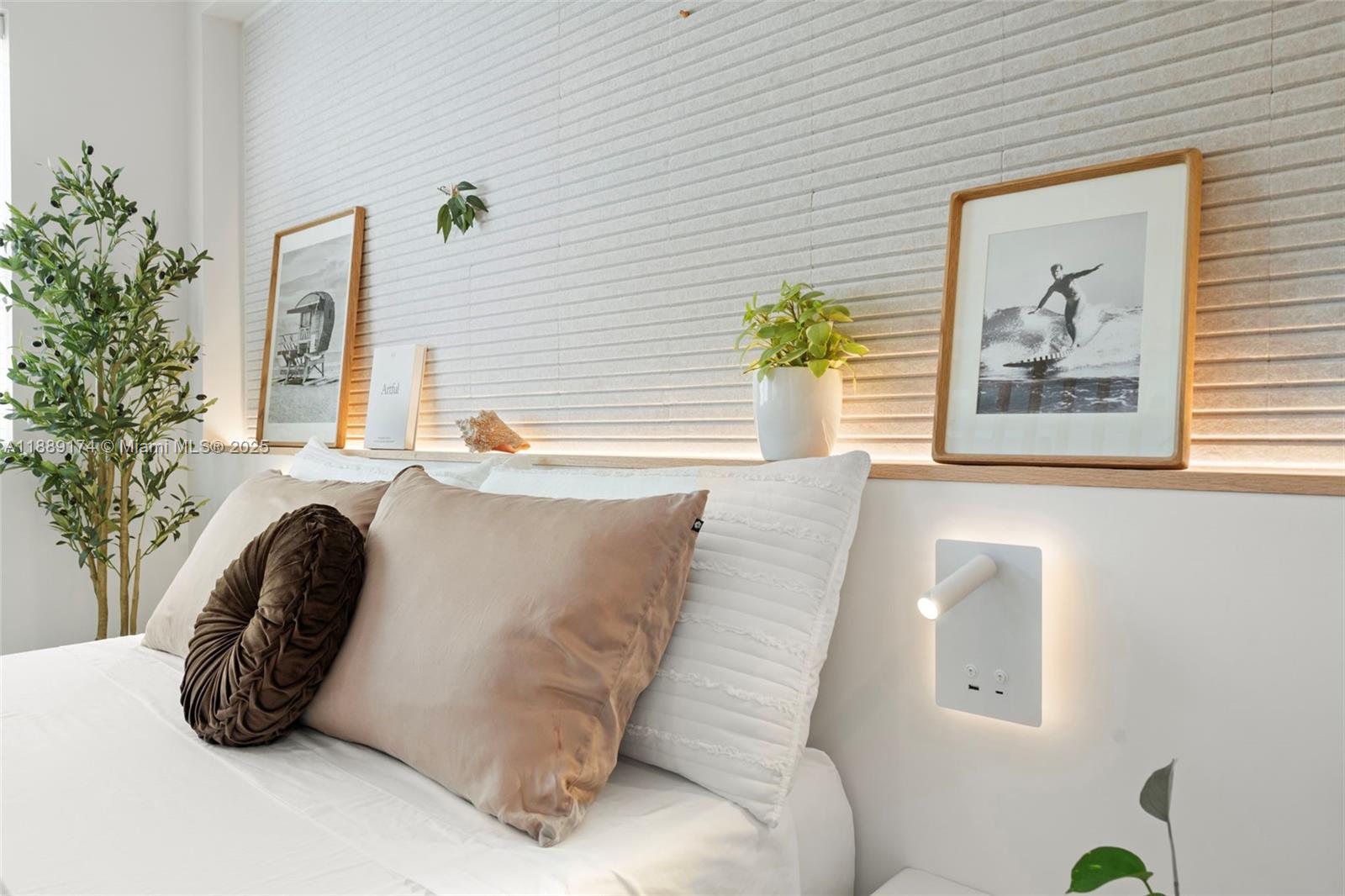 1390 Ocean Drive, Unit 202 Miami Beach, FL 33139 - Photo 25 of 80 a living room with furniture and a potted plant