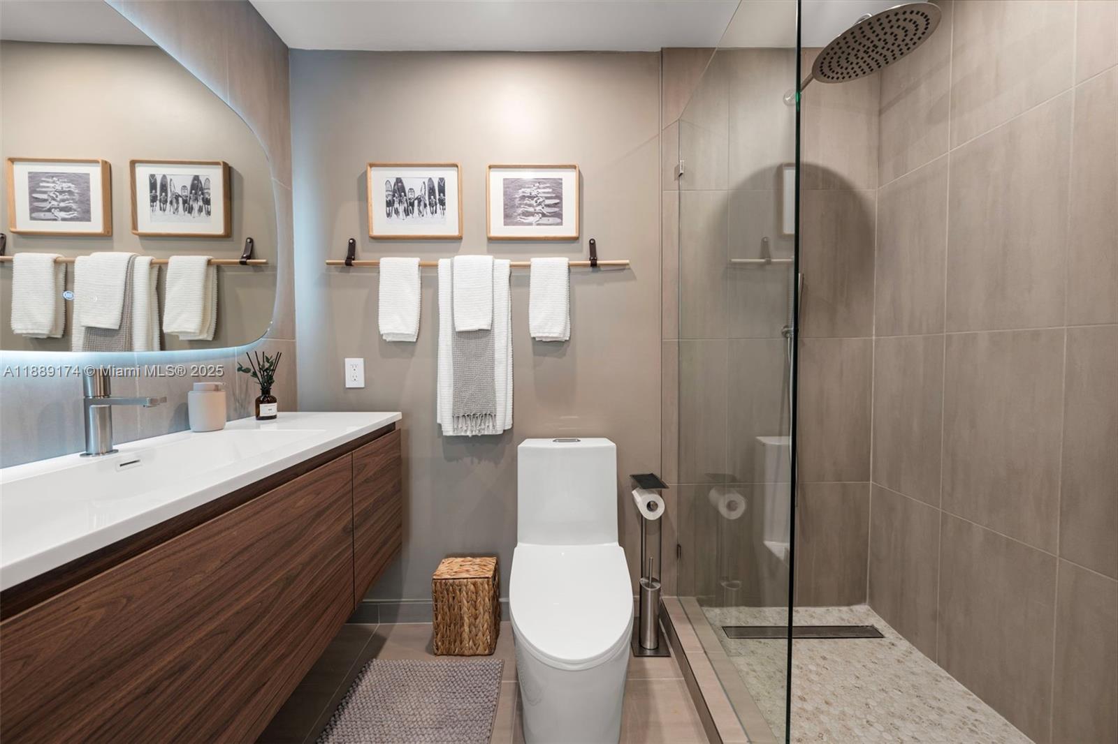 1390 Ocean Drive, Unit 202 Miami Beach, FL 33139 - Photo 32 of 80 a bathroom with a toilet sink and shower