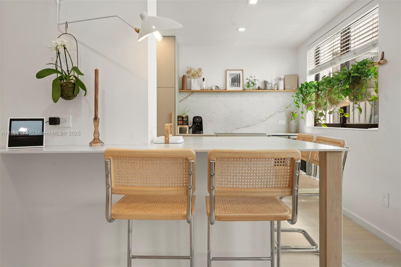 1390 Ocean Drive, Unit 202 Miami Beach, FL 33139 - Photo 4 of 80 a bathroom with a sink and a mirror