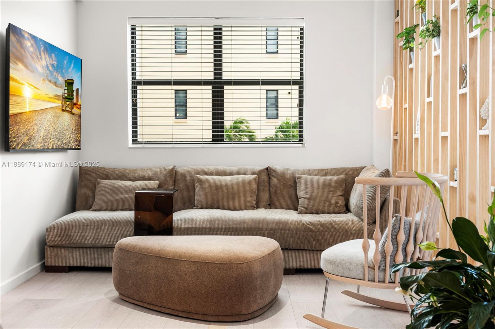 1390 Ocean Drive, Unit 202 Miami Beach, FL 33139 - Photo 43 of 80 a living room with furniture and a flat screen tv