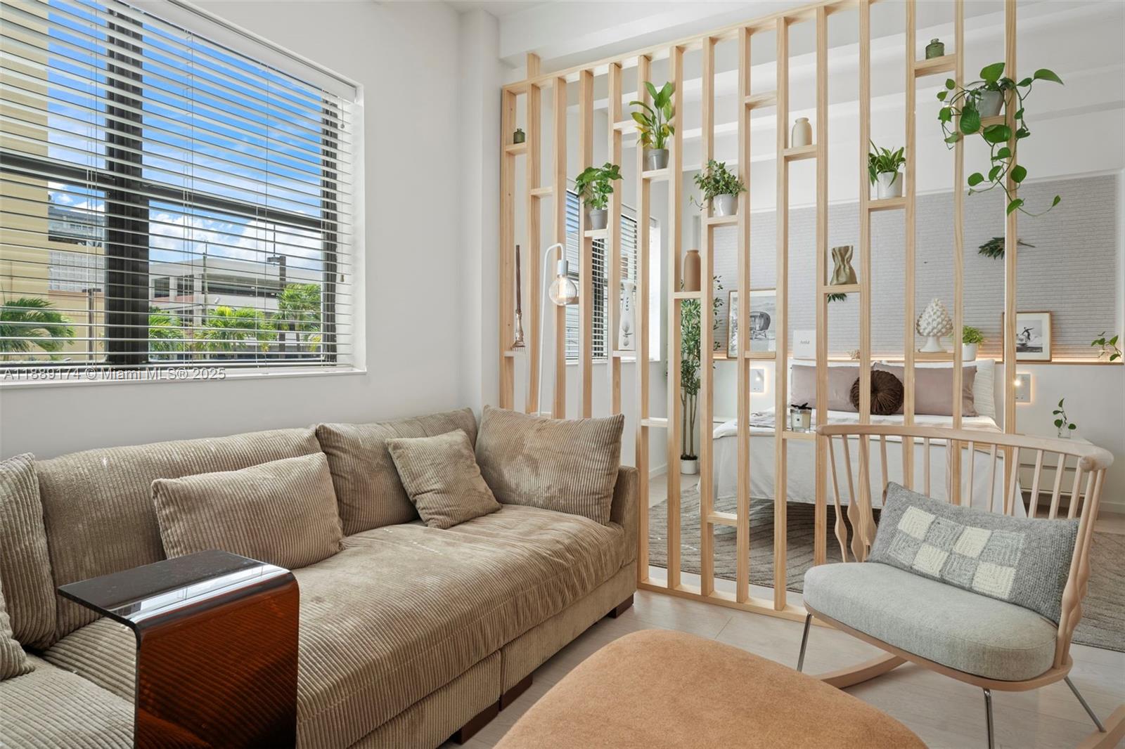 1390 Ocean Drive, Unit 202 Miami Beach, FL 33139 - Photo 5 of 80 a living room with furniture and a window