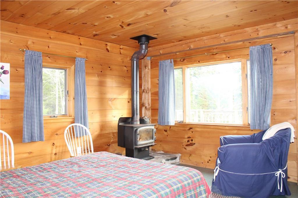484 Duck Cove Road Roque Bluffs, ME 04654 - Photo 24 of 34 One of two first floor bedrooms with...