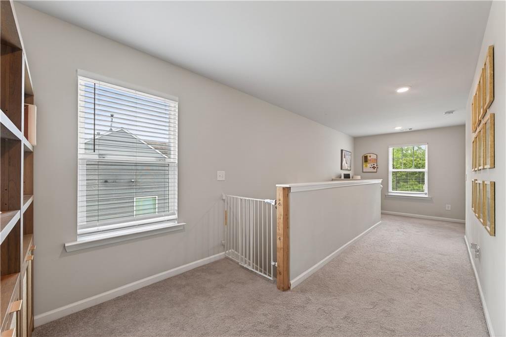 266 Shoals Bridge Road Acworth, GA 30102 - Photo 20 of 43 a view of a livingroom with a kitchen and a window
