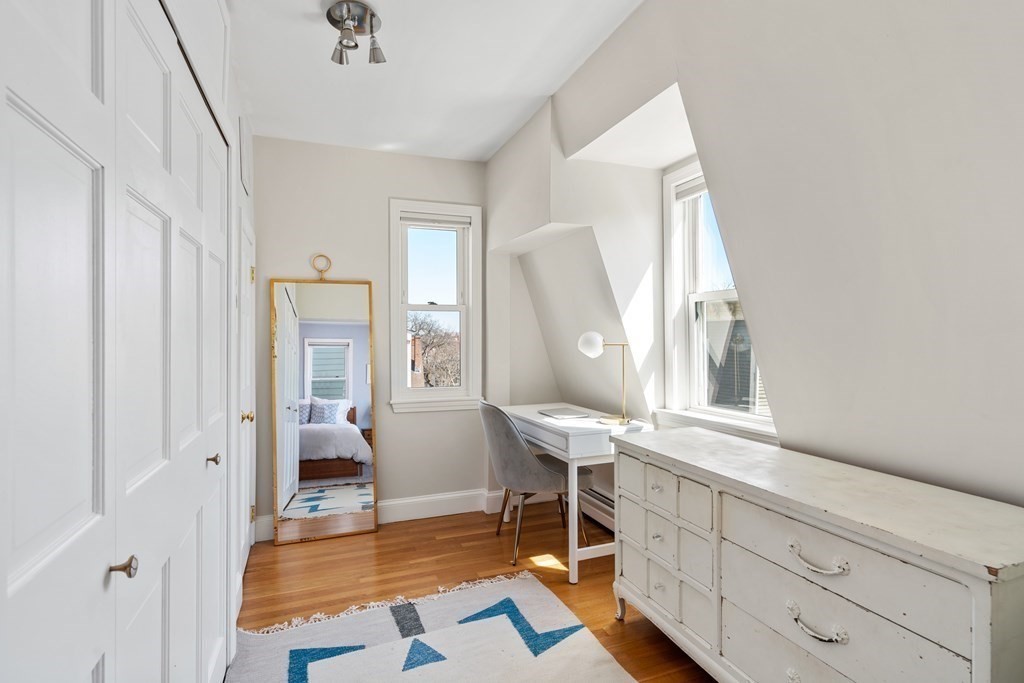 30 Cross Street, Unit 2 Boston, MA 02129 - Photo 13 of 18 a living room with furniture and a window