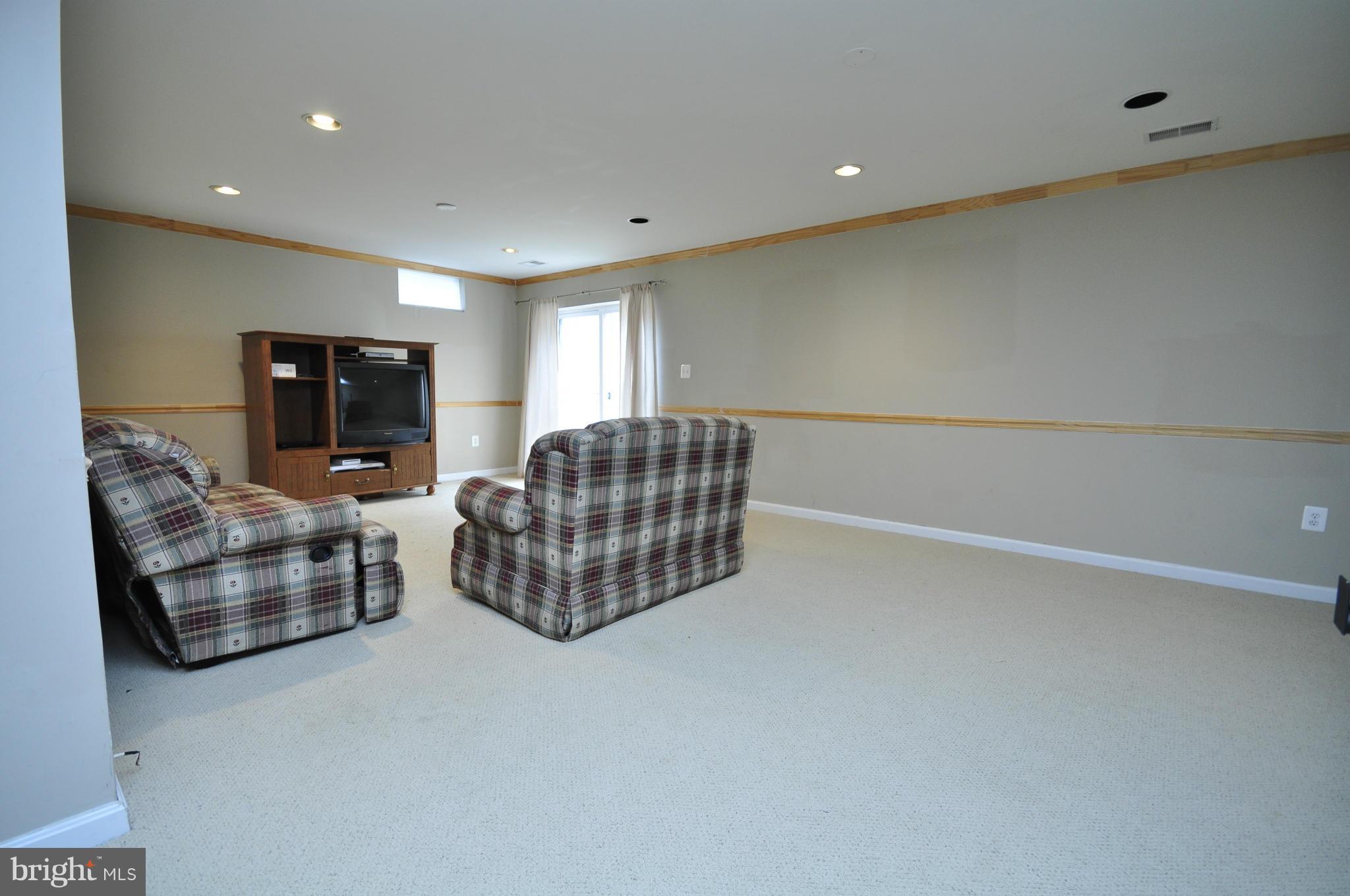 8943 Mullen Road King George, VA 22485 - Photo 23 of 29 Lower Level Recreation Room