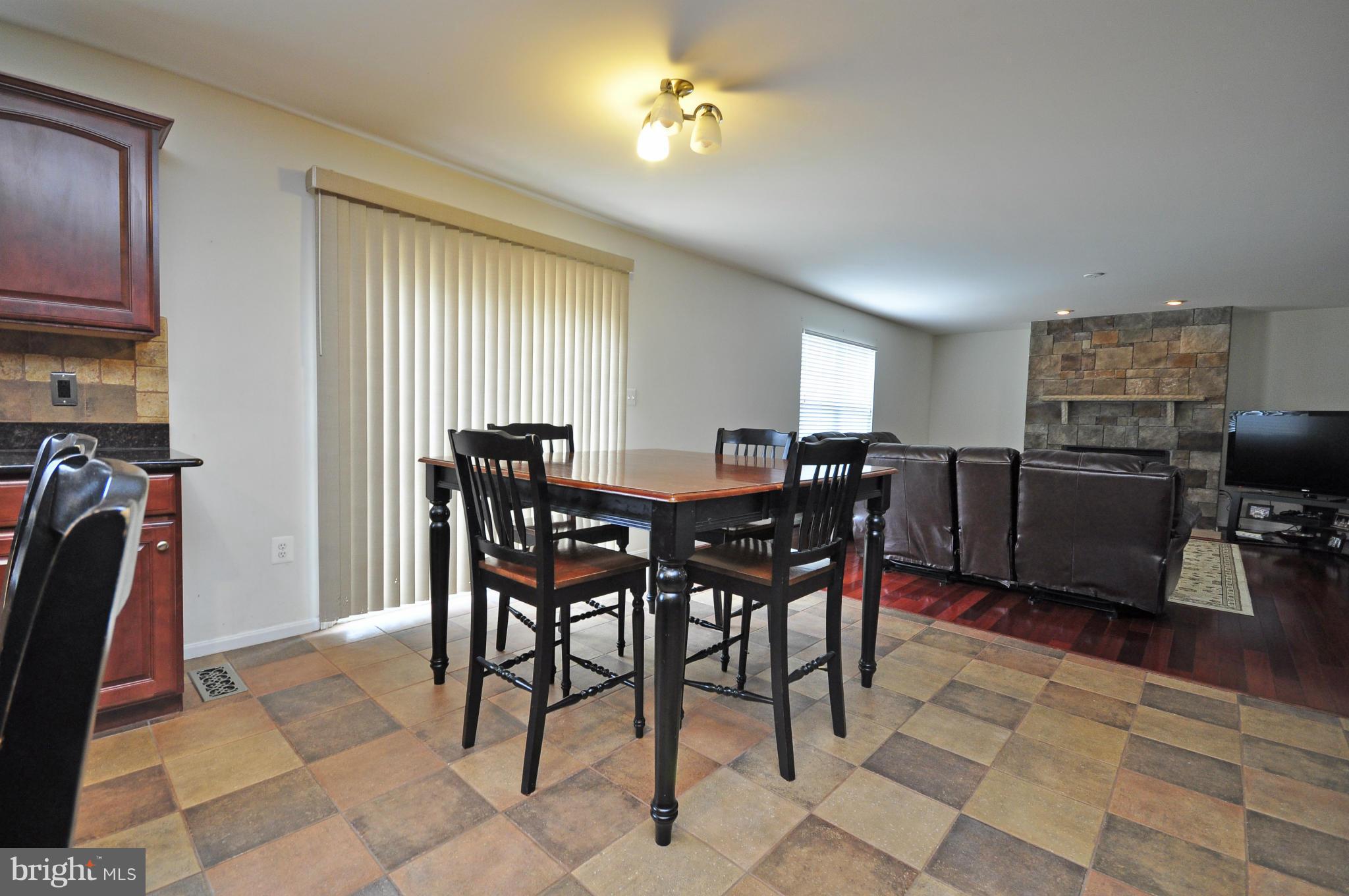 8943 Mullen Road King George, VA 22485 - Photo 8 of 29 Breakfast Room and Family Room