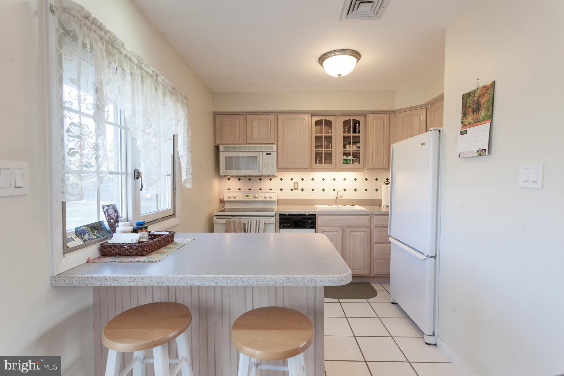 32 Jump Hill Road Levittown, PA 19056 - Photo 11 of 25 Kitchen with breakfast bar