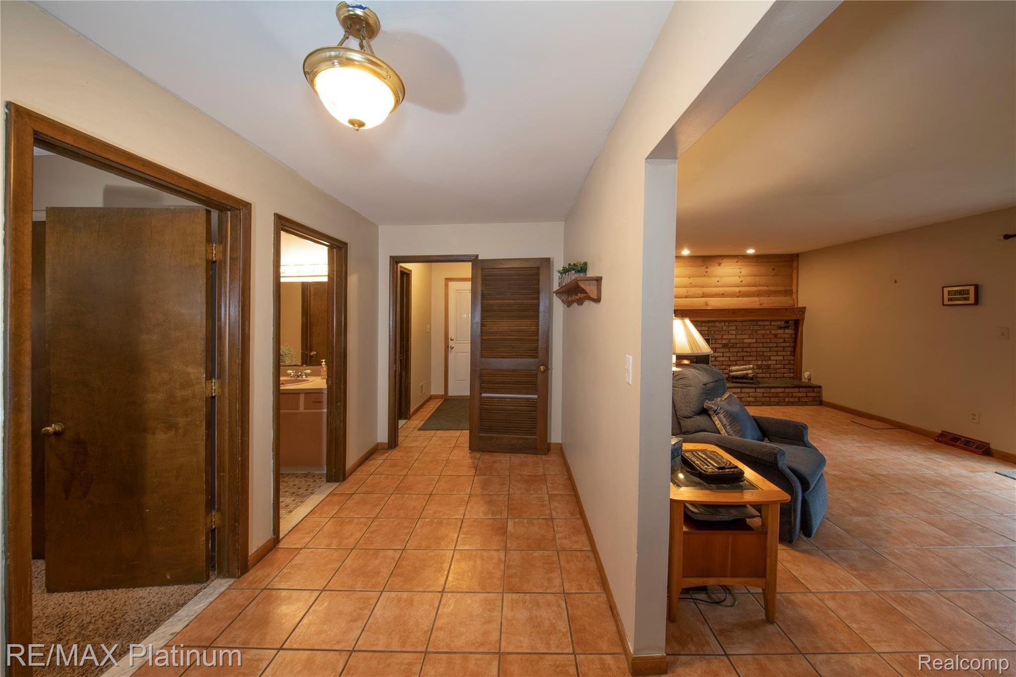 4750 Vines Road Howell, MI 48843 - Photo 23 of 35 Lower Level mud room area