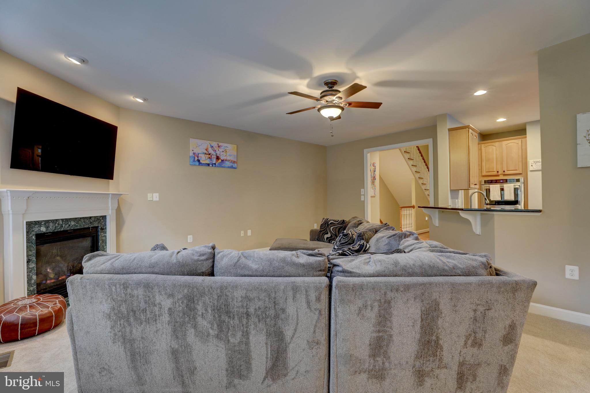 9124 Back Drop Drive Perry Hall, MD 21128 - Photo 14 of 69 a living room with furniture and a fireplace