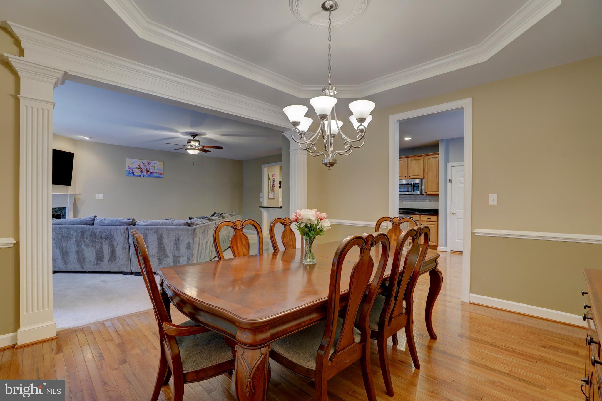9124 Back Drop Drive Perry Hall, MD 21128 - Photo 24 of 69 a view of a dining room with furniture and wooden floor