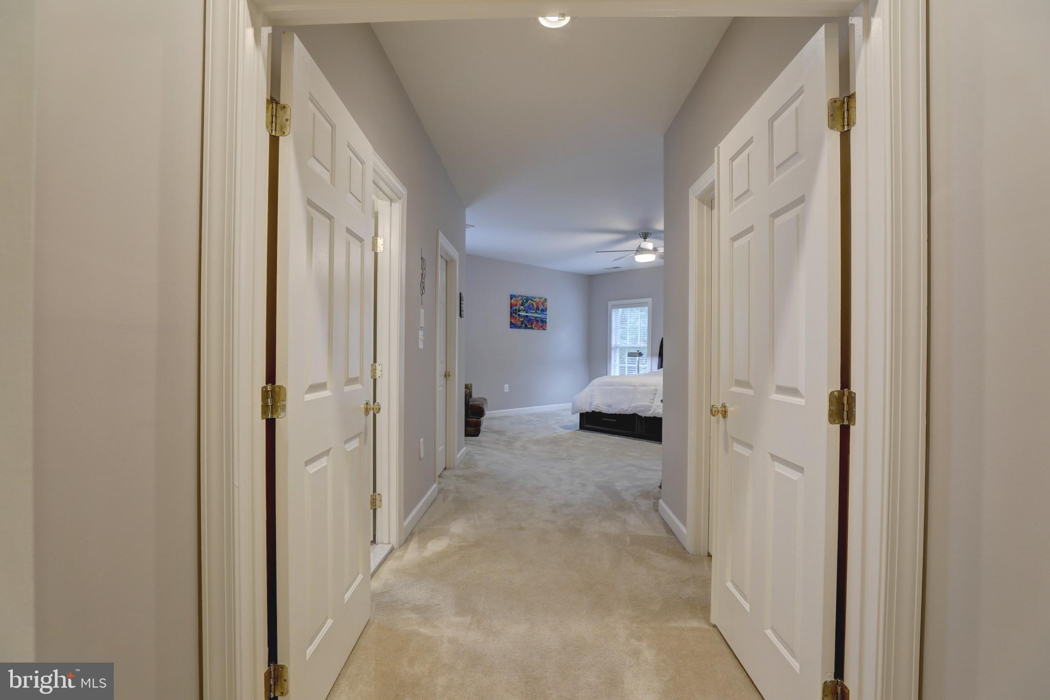 9124 Back Drop Drive Perry Hall, MD 21128 - Photo 27 of 69 a view of a hallway with a livingroom and a space windows