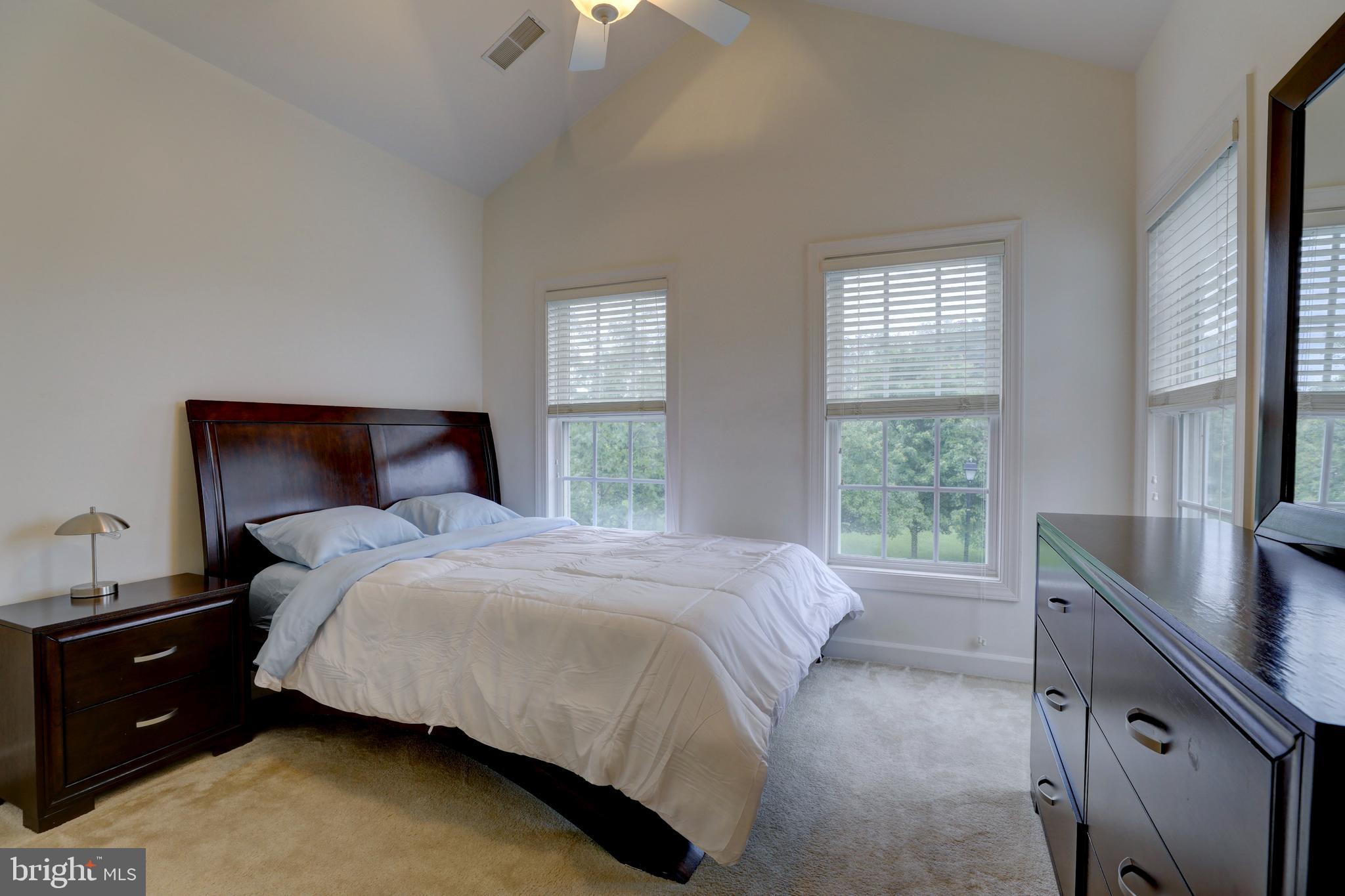 9124 Back Drop Drive Perry Hall, MD 21128 - Photo 39 of 69 a bedroom with a bed and a window