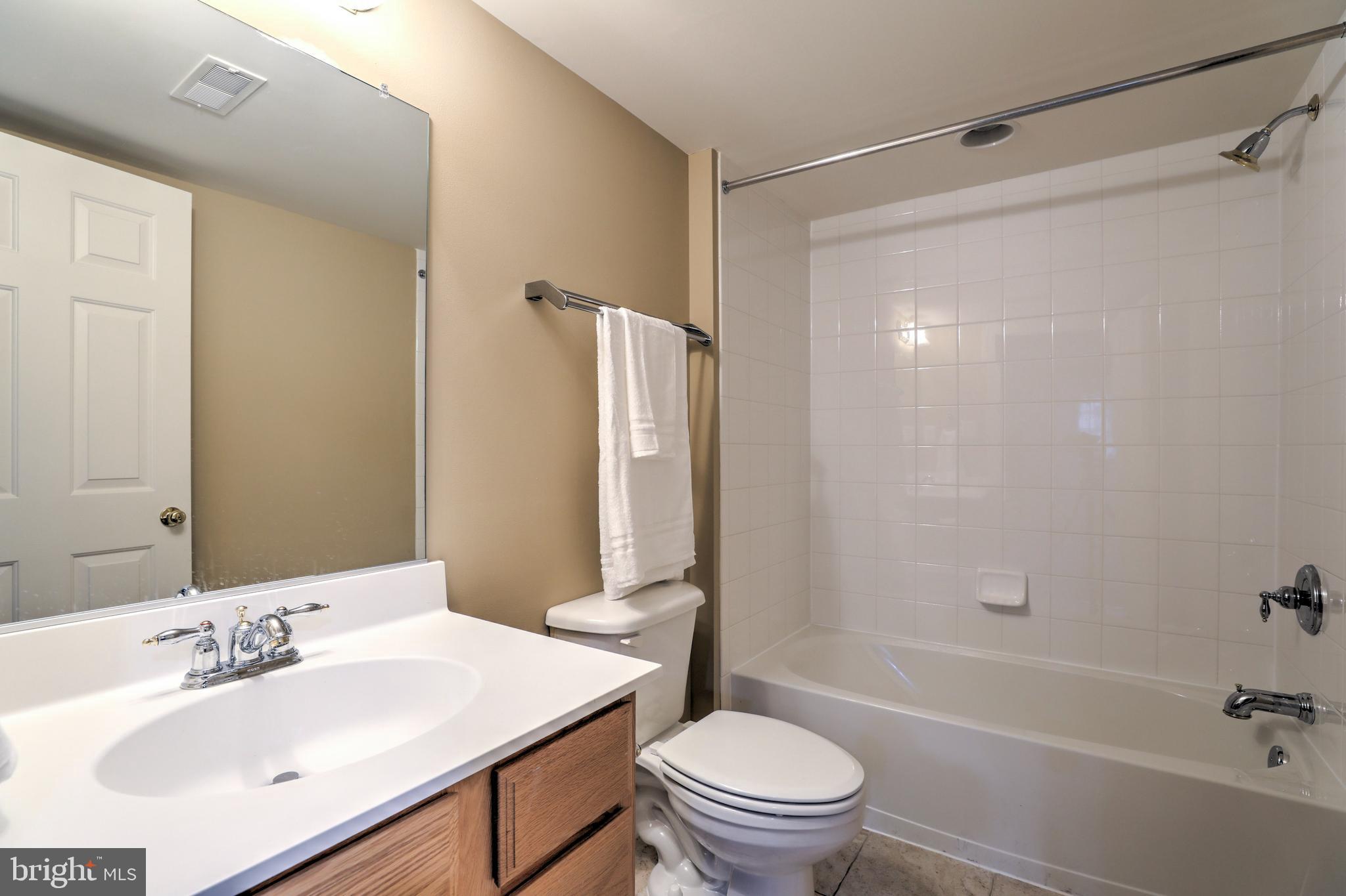9124 Back Drop Drive Perry Hall, MD 21128 - Photo 54 of 69 a bathroom with a sink toilet and shower