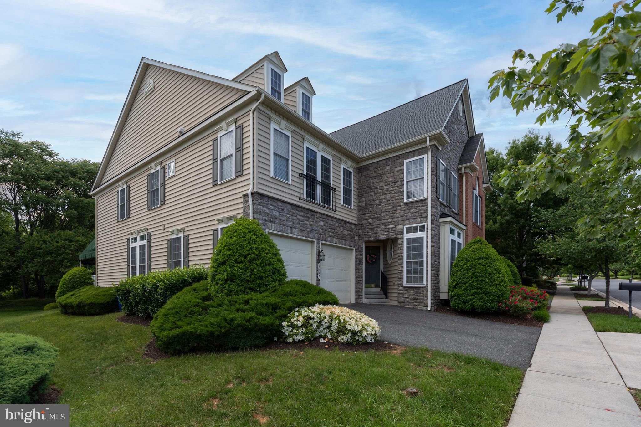 9124 Back Drop Drive Perry Hall, MD 21128 - Photo 60 of 69 a front view of a house with a garden