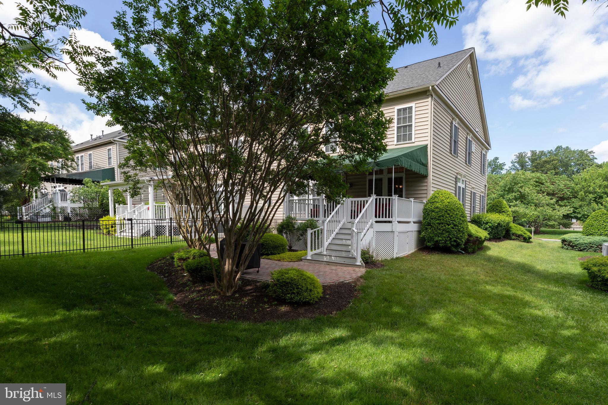 9124 Back Drop Drive Perry Hall, MD 21128 - Photo 61 of 69 a view of a house with a backyard