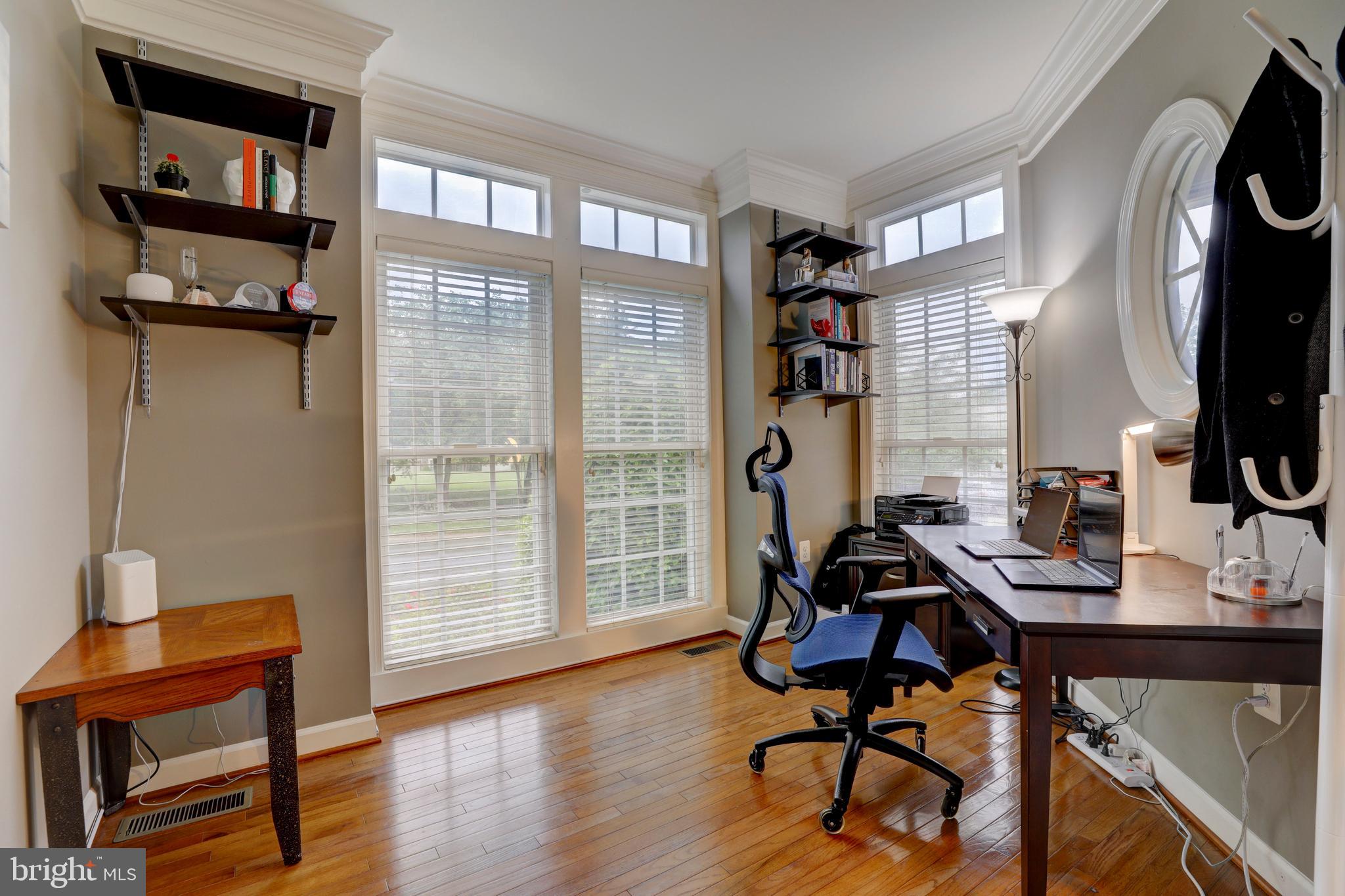 9124 Back Drop Drive Perry Hall, MD 21128 - Photo 8 of 69 a view of a workspace with furniture and a window