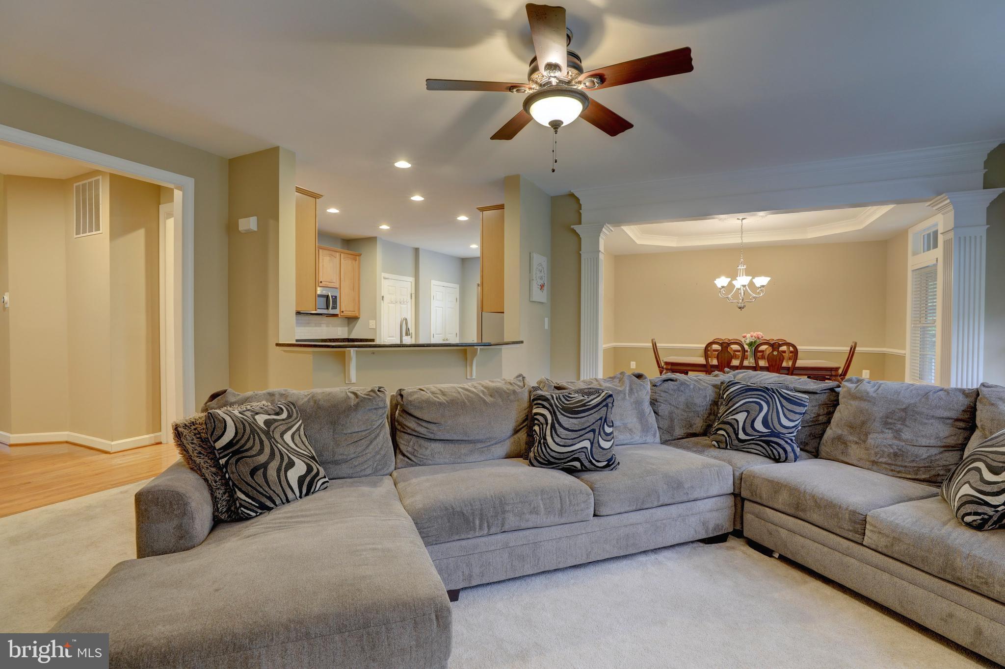 9124 Back Drop Drive Perry Hall, MD 21128 - Photo 10 of 69 a living room with furniture and a ceiling fan