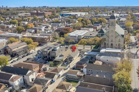 an aerial view of a city with lots of residential buildings