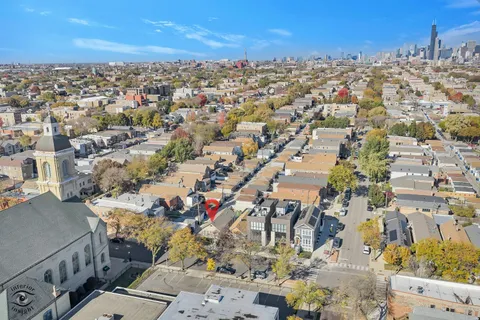 an aerial view of a city with lots of residential buildings
