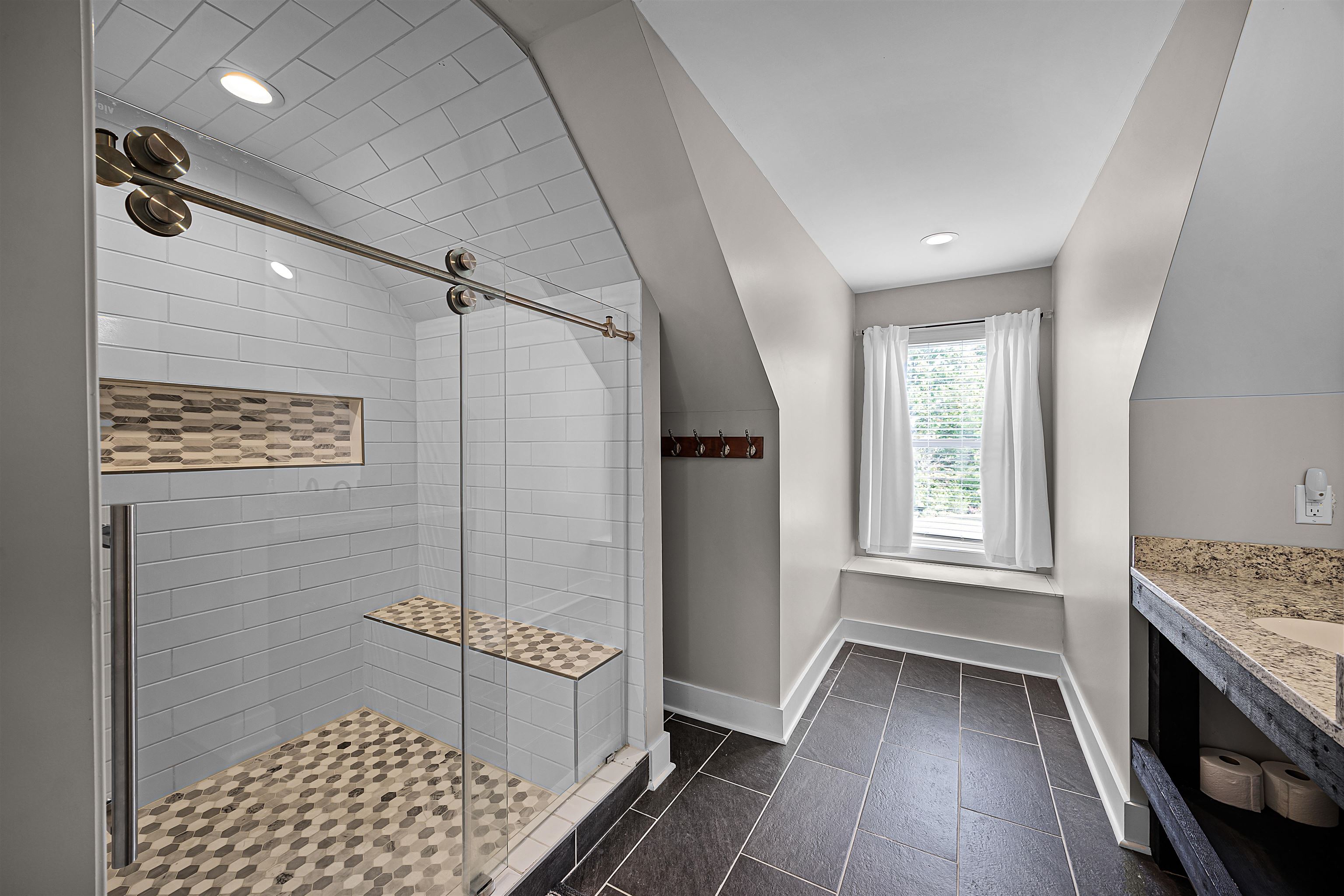 939 Eagle Point Drive Cherokee, AL 35616 - Photo 16 of 40 a bathroom with a sink a vanity and a mirror