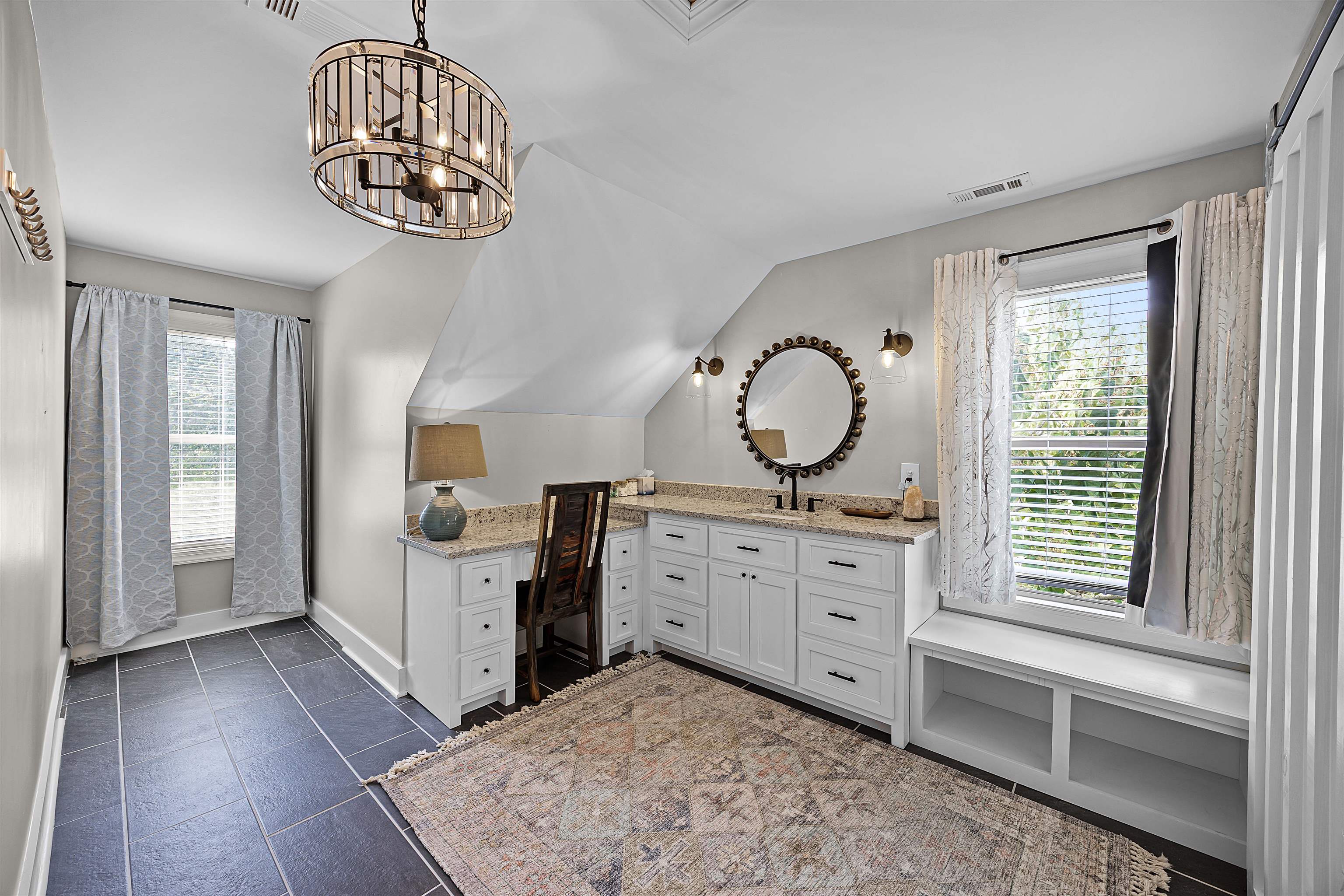 939 Eagle Point Drive Cherokee, AL 35616 - Photo 23 of 40 a view of a kitchen with a window wooden floor and a chandelier