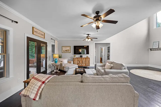 a bed room with a bed and a chandelier