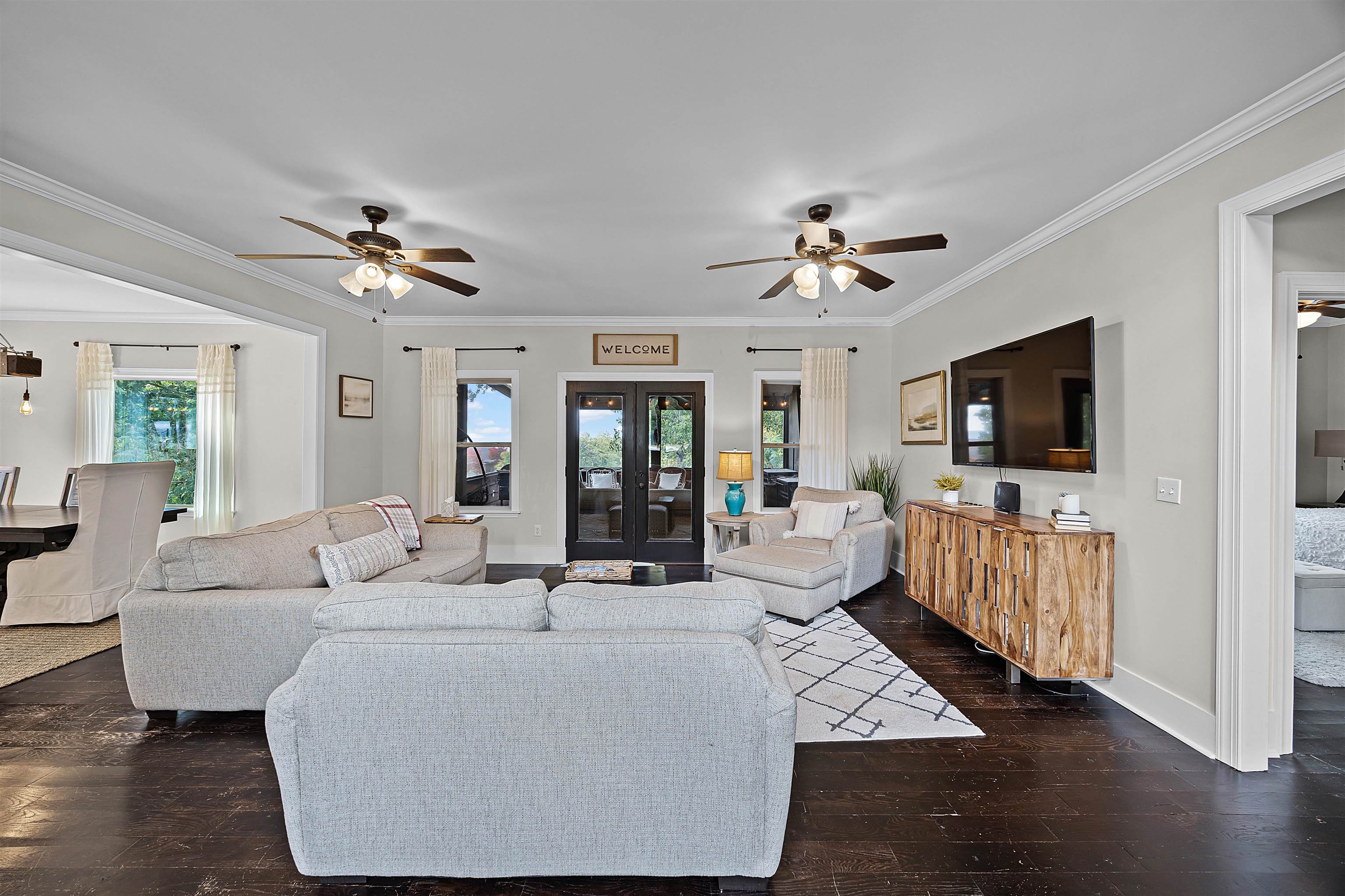 939 Eagle Point Drive Cherokee, AL 35616 - Photo 8 of 40 a living room with furniture and a flat screen tv