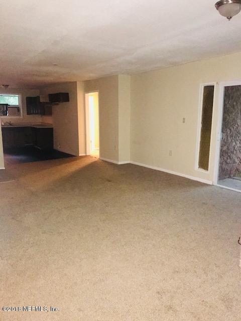 5875 Spellman Road Jacksonville, FL 32209 - Photo 11 of 14 a view of empty room with window