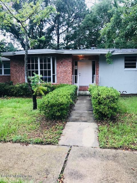5875 Spellman Road Jacksonville, FL 32209 - Photo 2 of 14 a front view of a house with garden