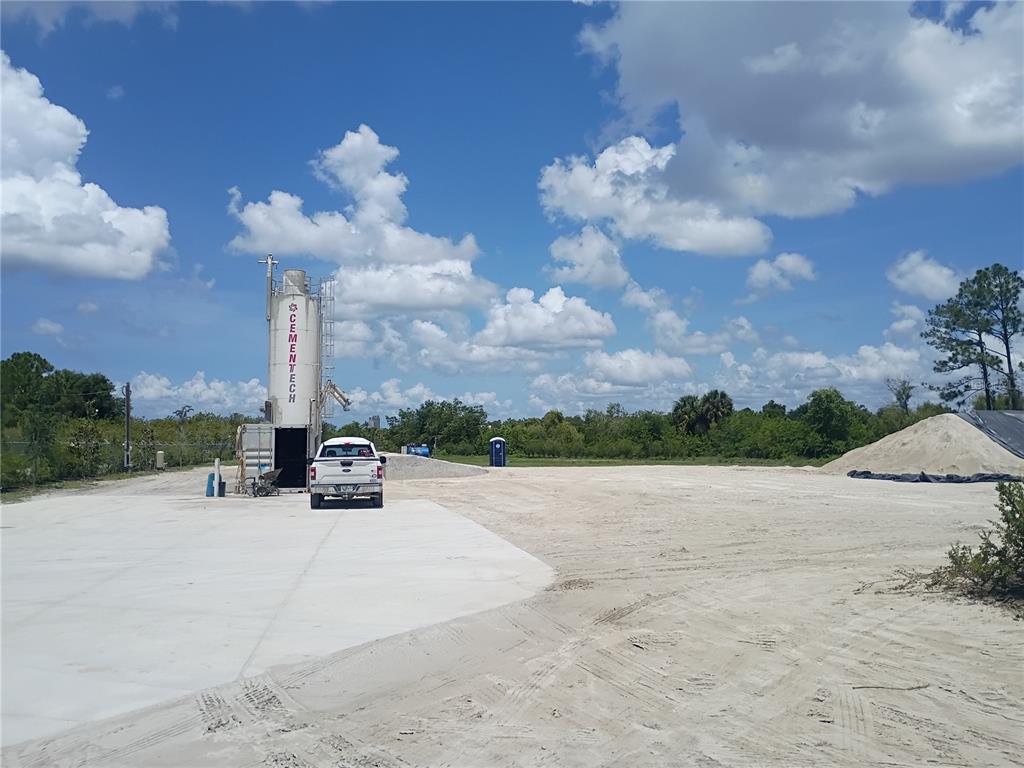 6255 Taylor Road Punta Gorda, FL 33950 - Photo 5 of 6 a view of outdoor space with playground and green space
