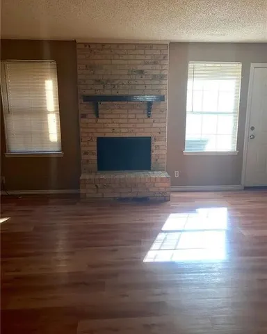 a living room with a fireplace
