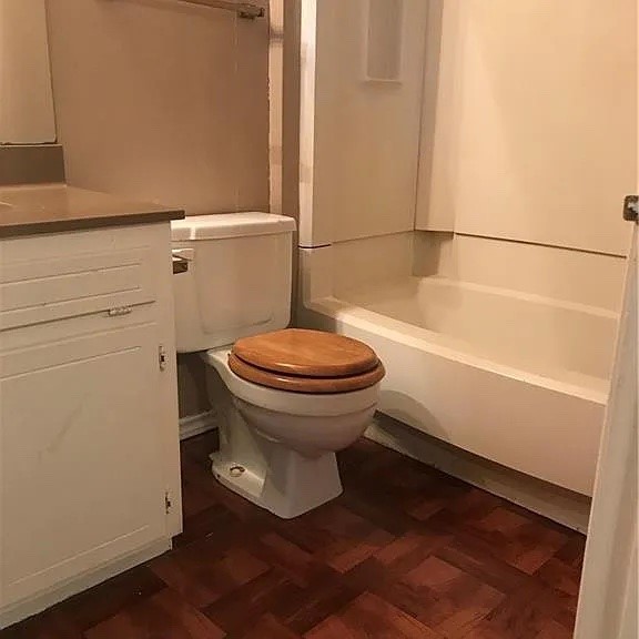 2409 MacArthur Drive, Unit 2409 Waco, TX 76708 - Photo 9 of 10 a bathroom with a sink and a toilet