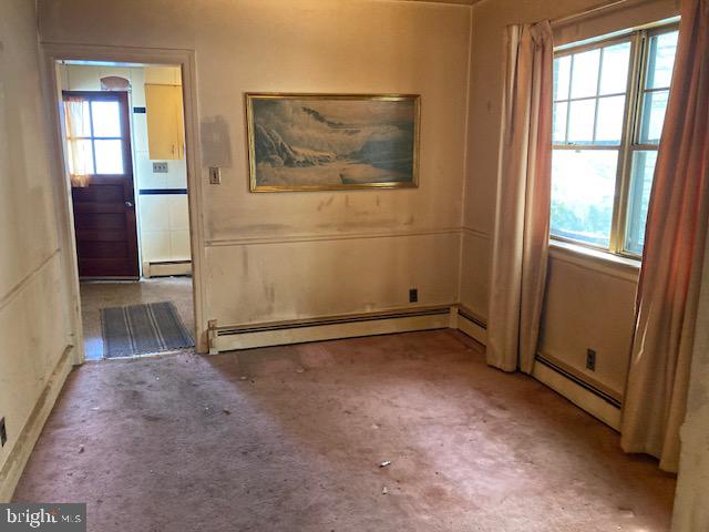 502 South Shenandoah Road Ringtown, PA 17967 - Photo 7 of 20 an empty room with windows
