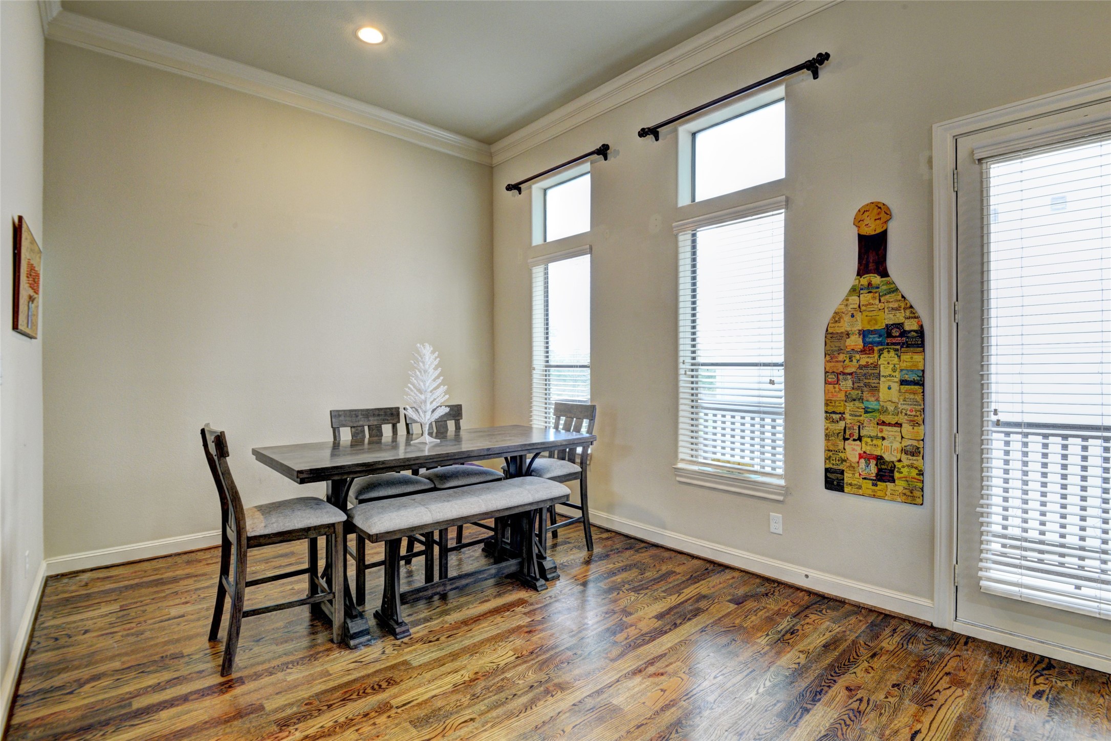 2803 Sherwin Street Houston, TX 77007 - Photo 8 of 19 a view of a dining room with furniture and windows
