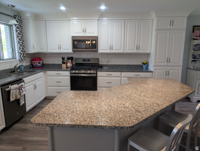 897 East 1200 North Mapleton, UT 84664 - Photo 12 of 54 Kitchen with stainless steel appliances, tasteful backsplash, white cabinets, and granite countertops