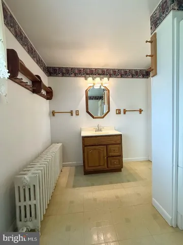 a view of a big house with a big yard