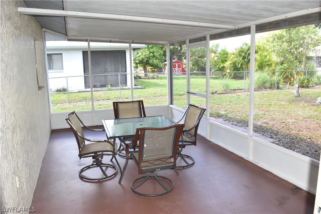 17404 Homewood Road Fort Myers, FL 33967 - Photo 2 of 26 a view of a dining room with furniture window and outside view