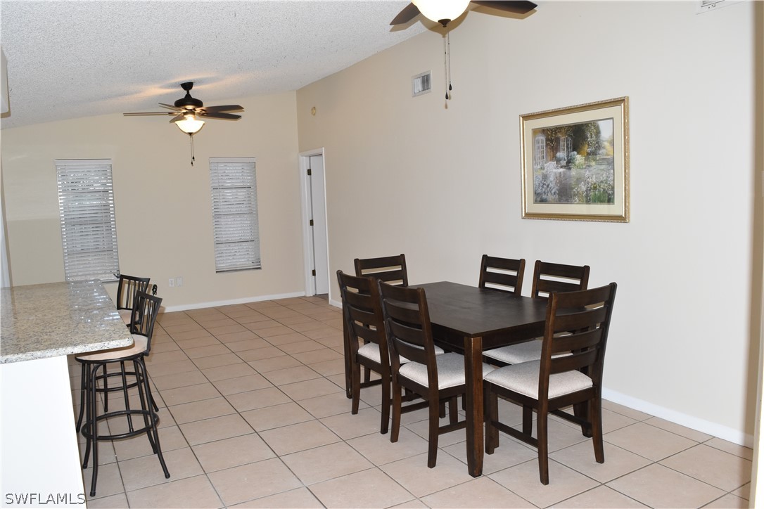 17404 Homewood Road Fort Myers, FL 33967 - Photo 7 of 26 a view of a dining room with furniture
